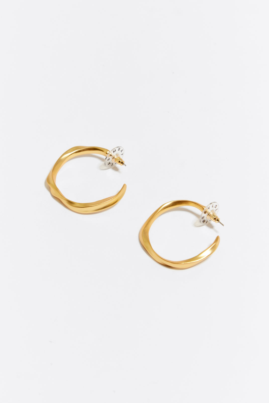 Maxi golden irregular hoop earrings