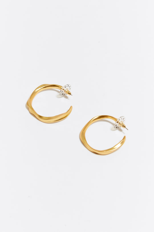 Maxi golden irregular hoop earrings