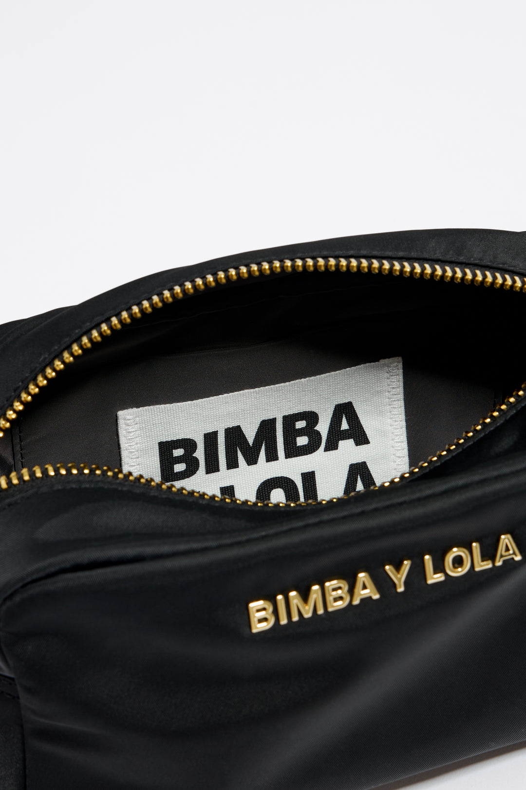 Small black nylon crossbody bag
