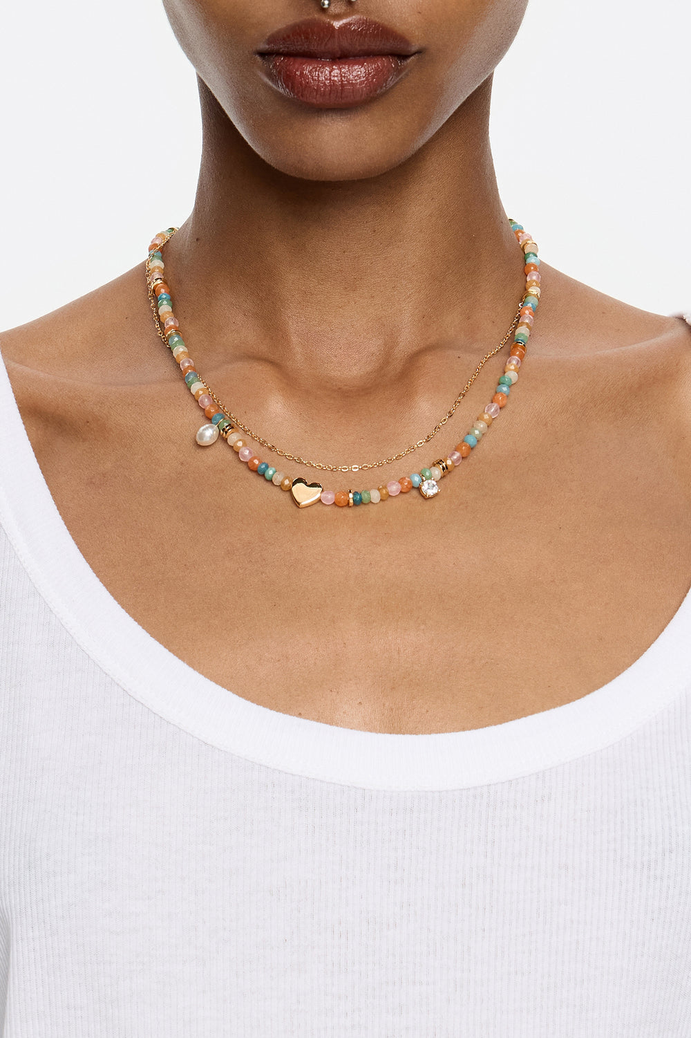 Pink stones and gold heart necklace