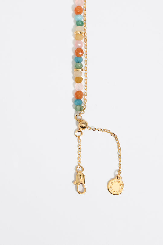 Pink stones and gold heart necklace