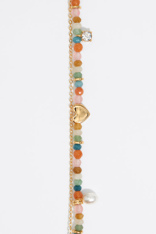 Gold heart and pink stones bracelet