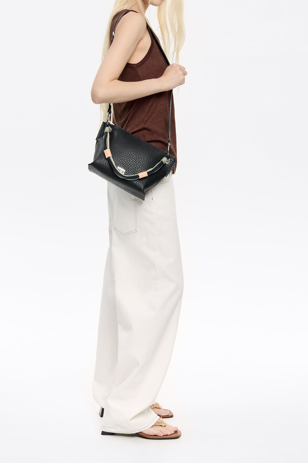 Medium black leather trapezium bag