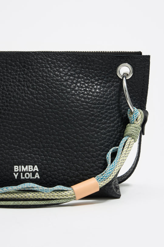 Medium black leather trapezium bag