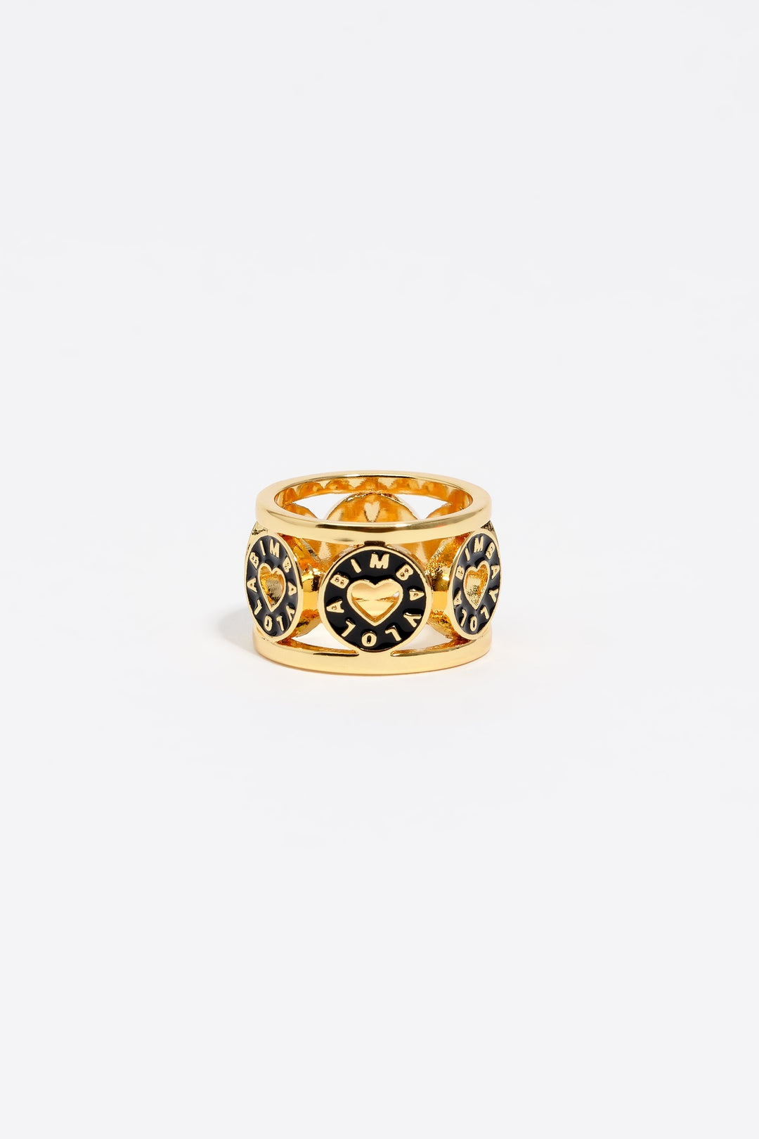 Gold-tone metal ring with black heart logo