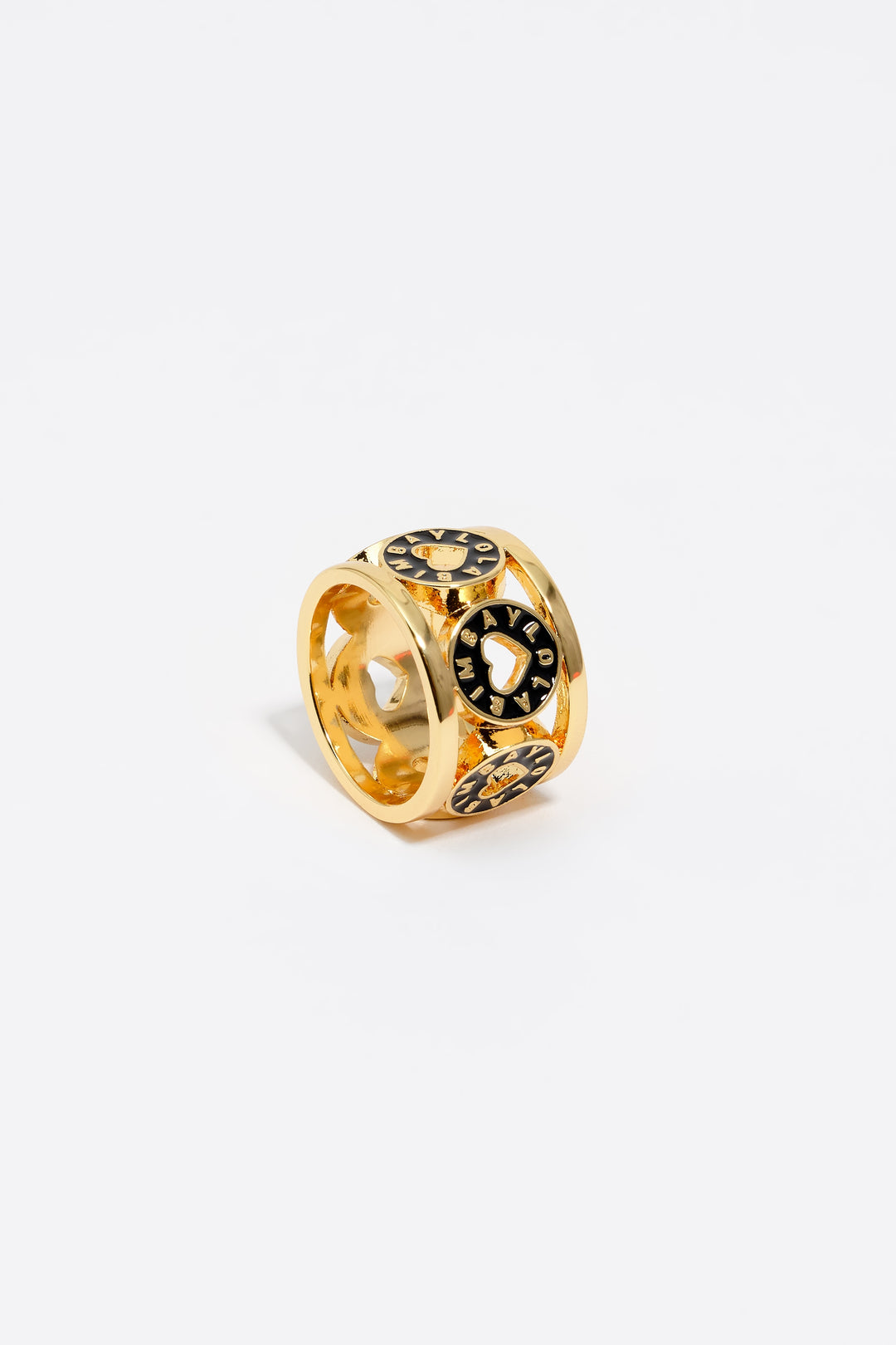 Gold-tone metal ring with black heart logo