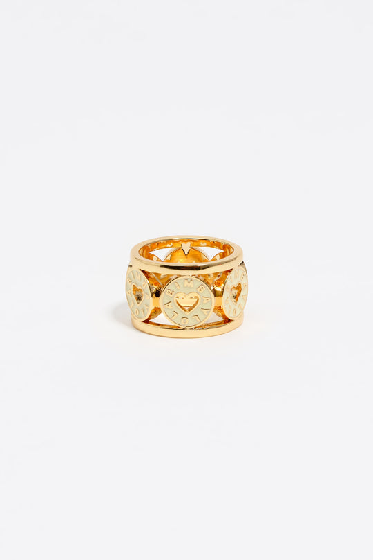 Gold-tone metal ring with ivory heart logo