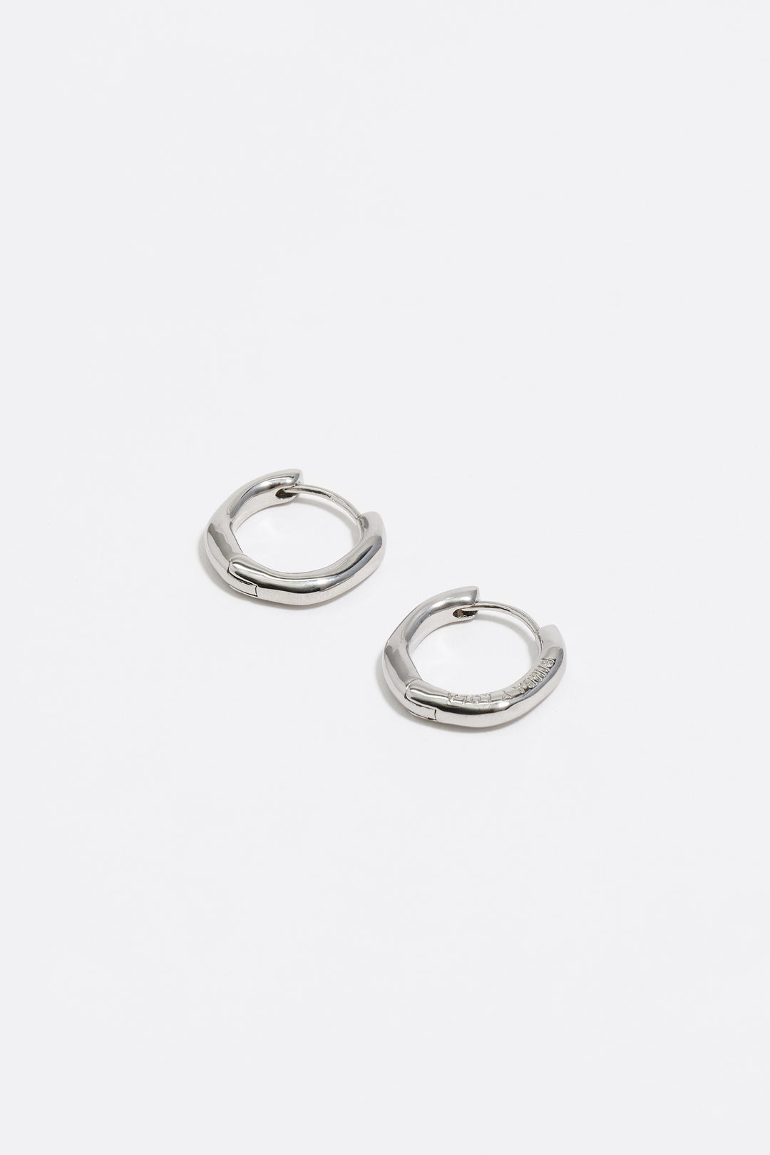 Silver irregular hoop earrings