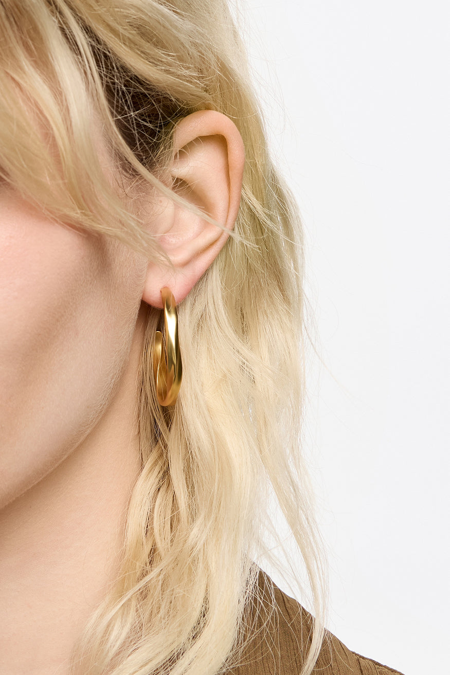 Maxi matte gold uneven hoop earrings