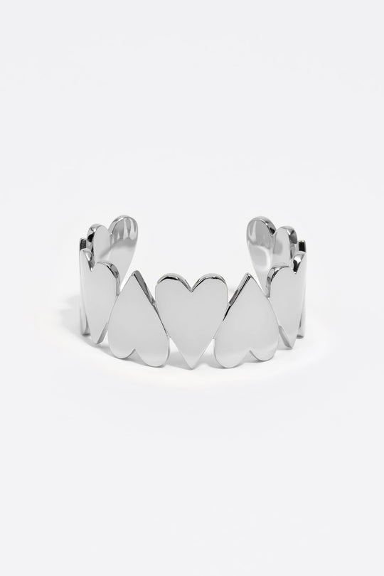 Silver hearts rigid bracelet