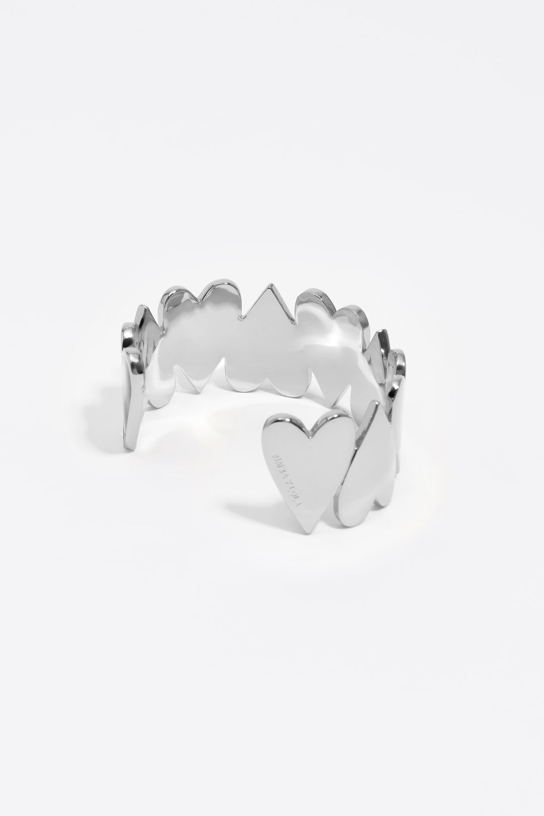 Silver hearts rigid bracelet