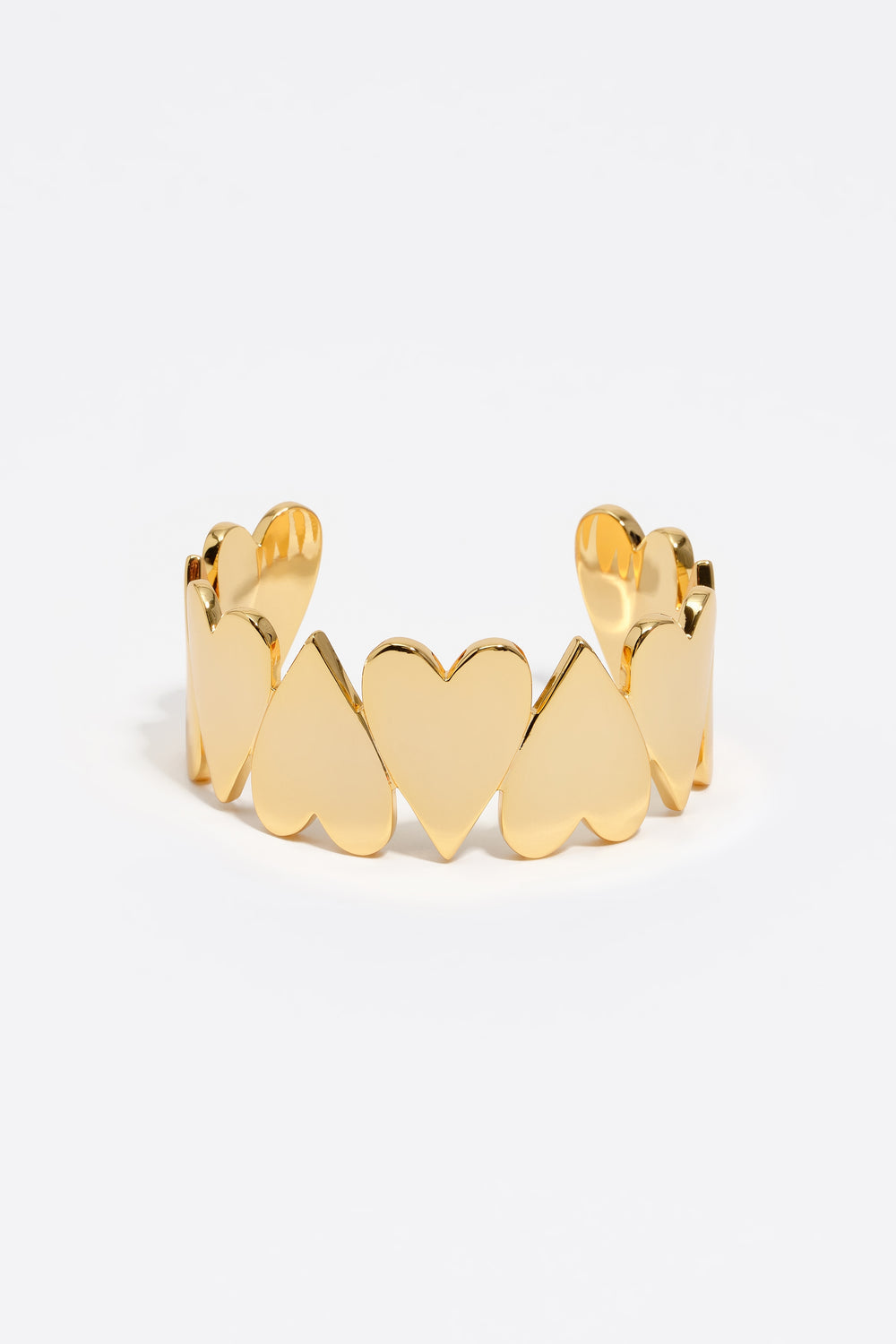Gold hearts rigid bracelet