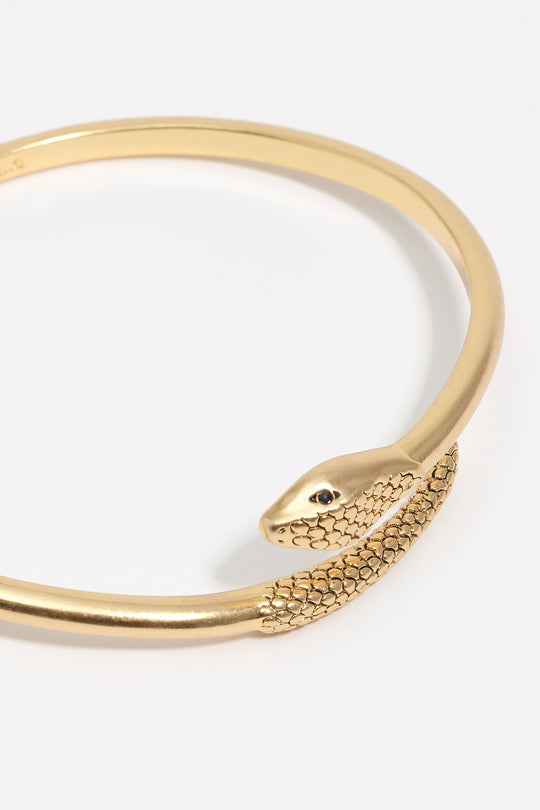 Aged gold rigid textured snake bracelet
