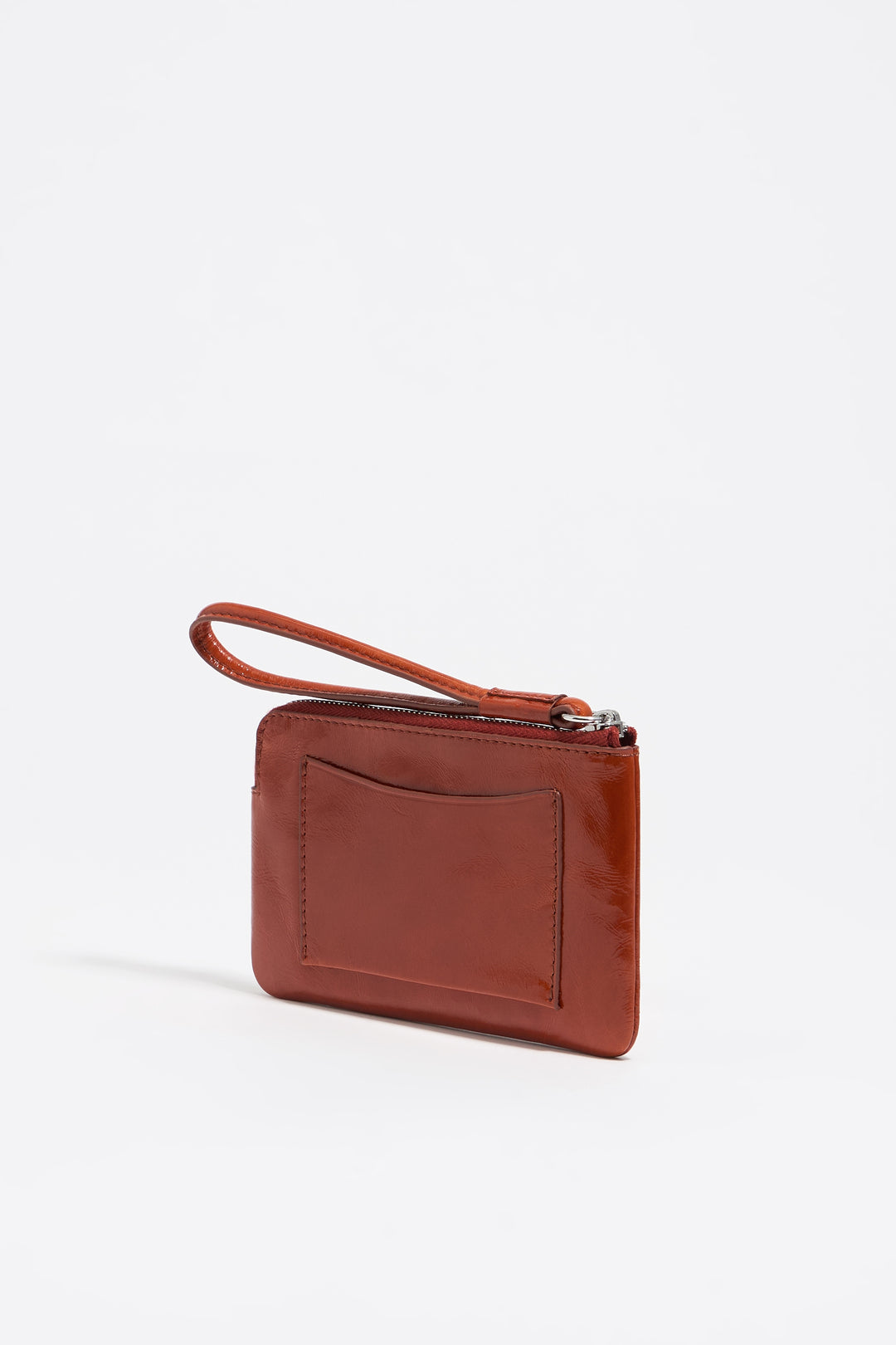 Small burnt orange leather coin purse