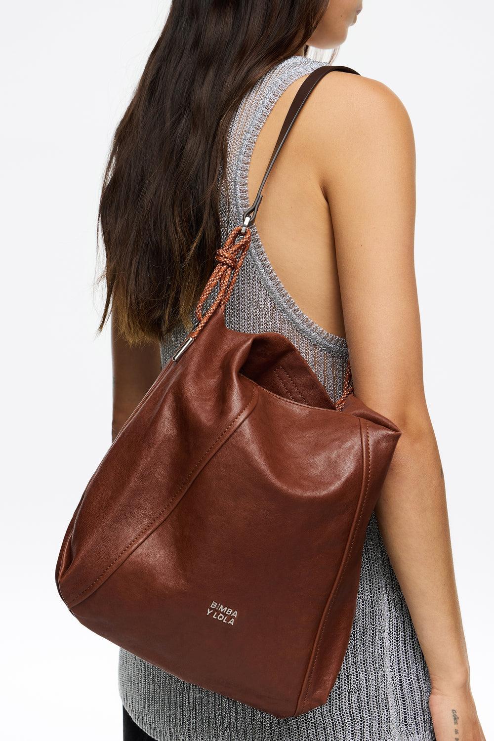 Medium dark tan leather Paper bag