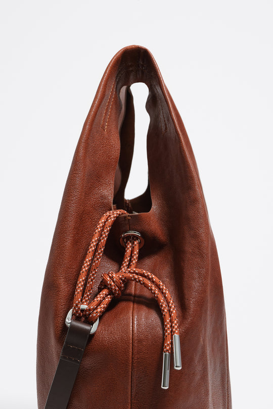 Medium dark tan leather Paper bag