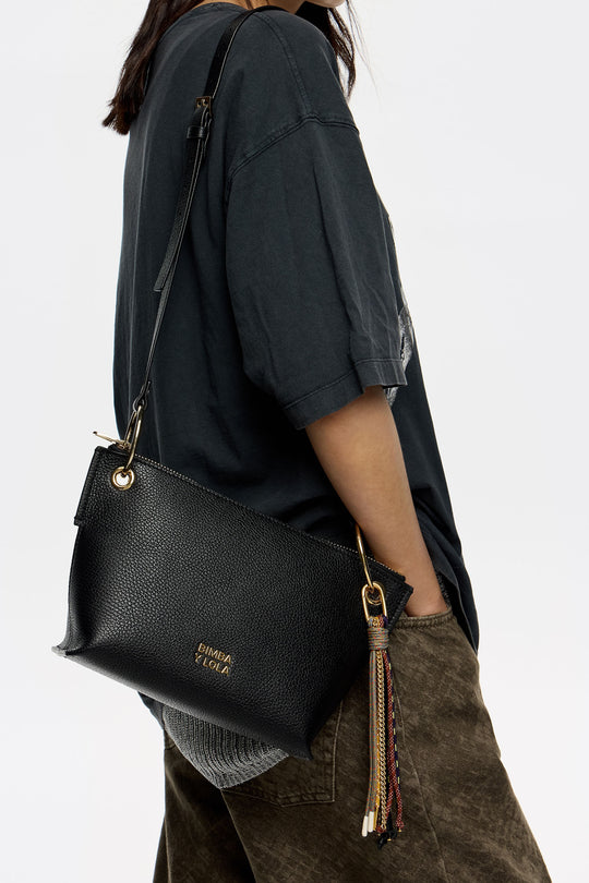 Medium black leather trapezium bag