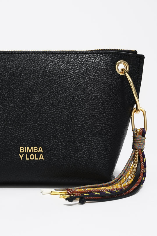 Medium black leather trapezium bag