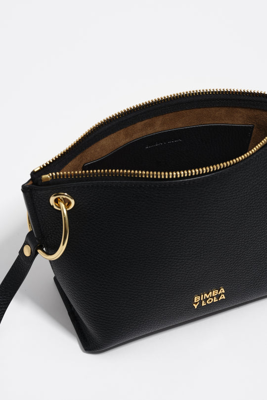 Medium black leather trapezium bag