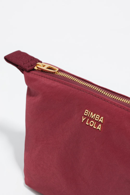 Small burgundy nylon Trapecio make-up case