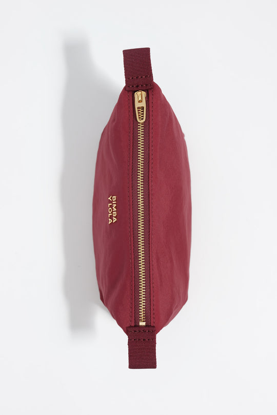 Small burgundy nylon Trapecio make-up case