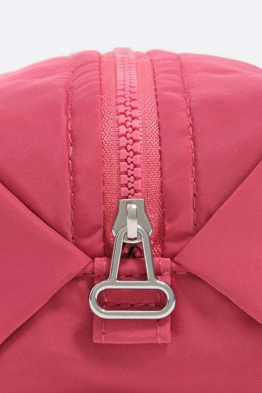 Small dark pink nylon make-up case