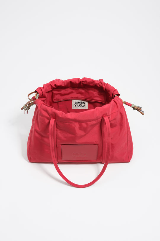 Large red nylon shoulder bag