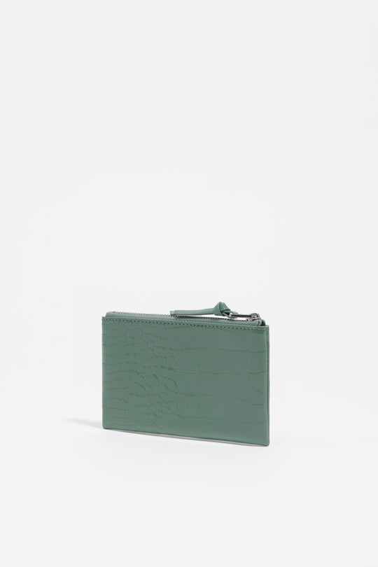 Shiny pastel green textured coin purse