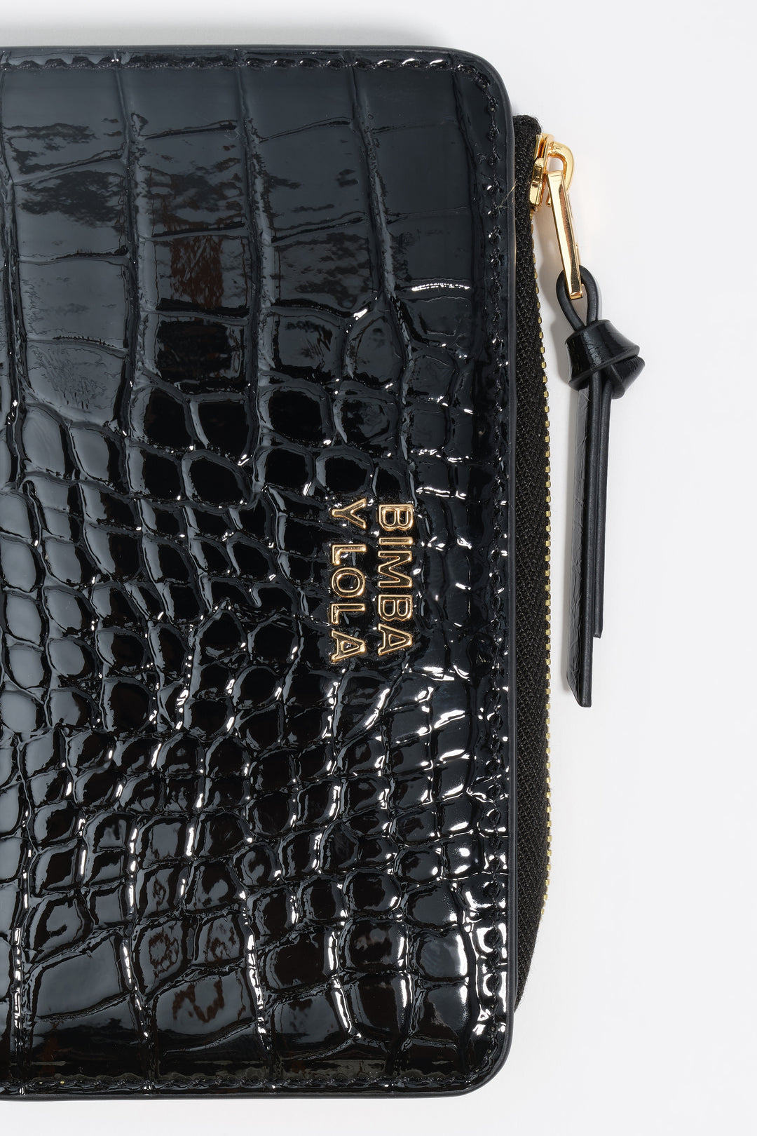 Shiny black textured purse