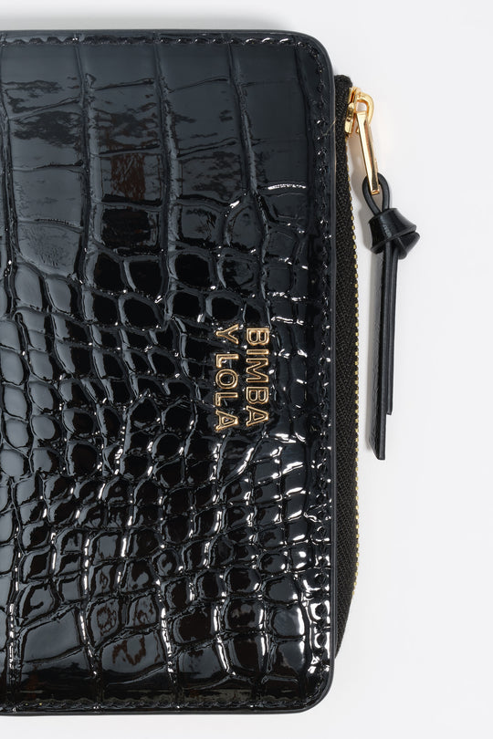 Shiny black textured purse