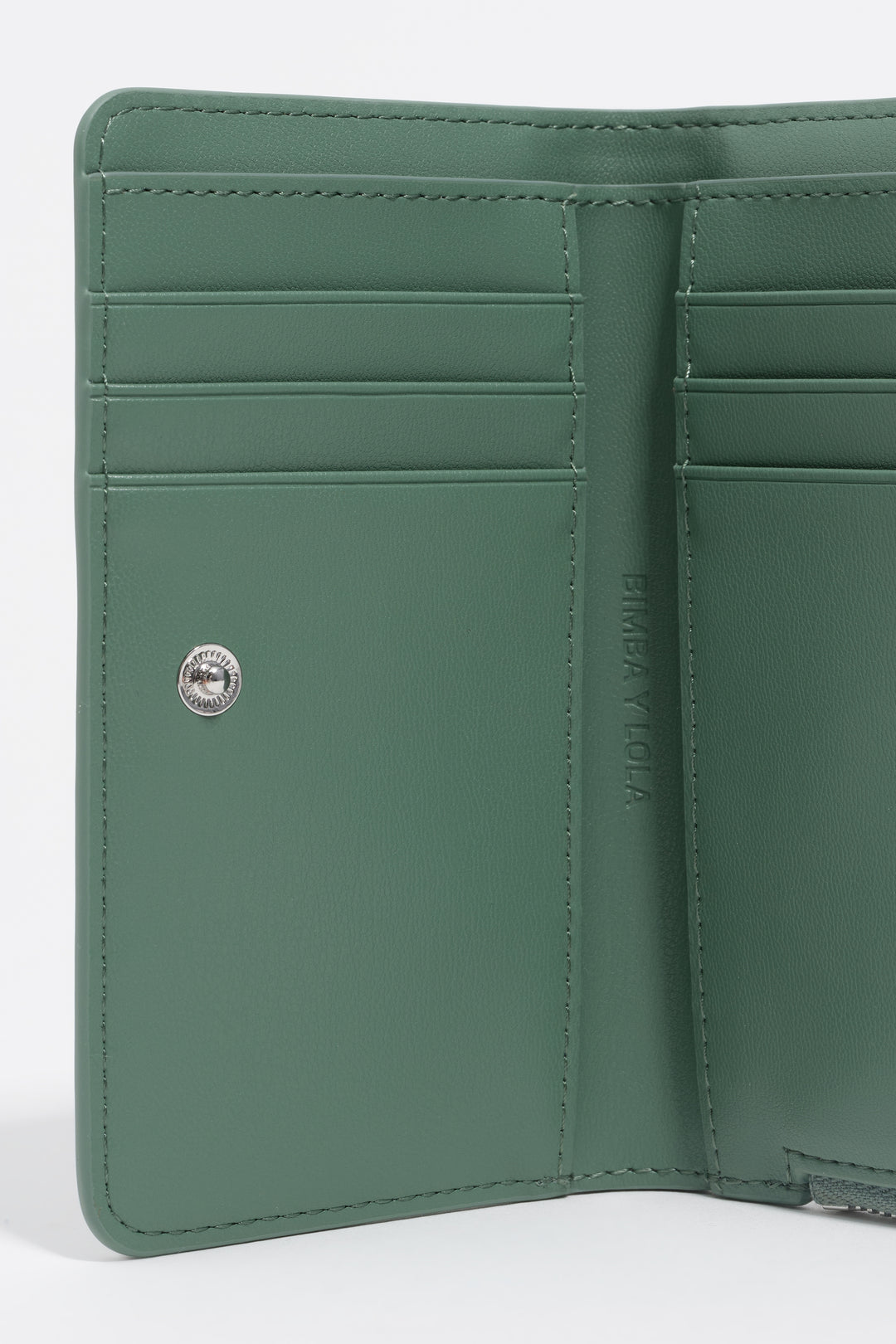 Shiny pastel green textured purse