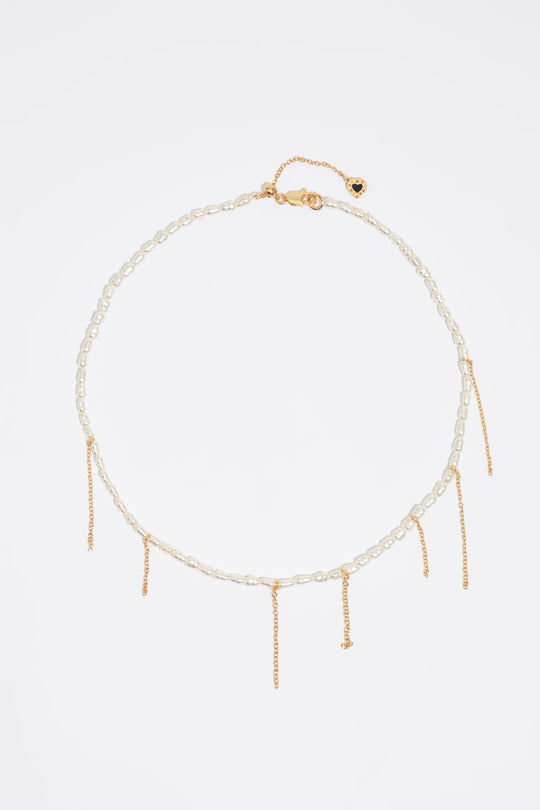 Gold chains and pearl necklace