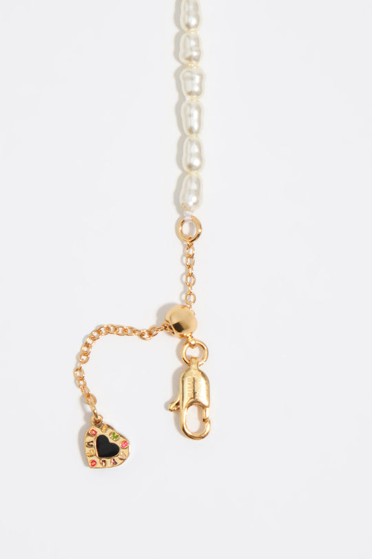 Gold chains and pearl necklace