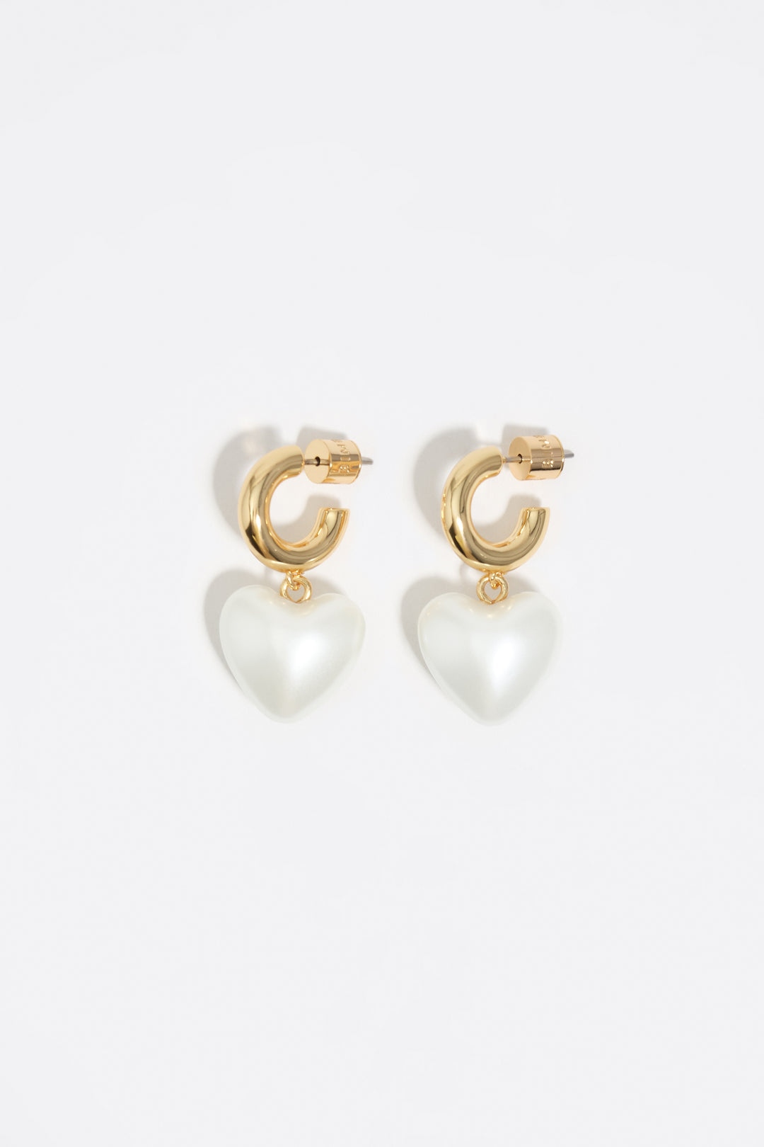 Gold hoop earrings and pearl heart