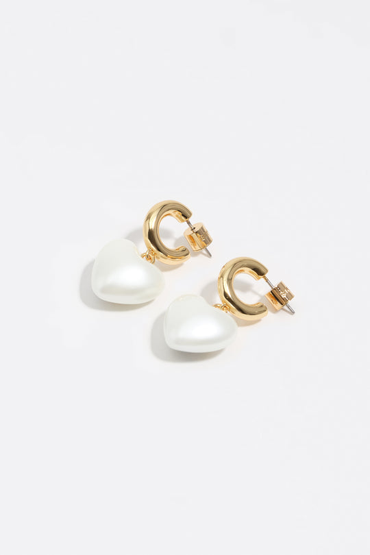 Gold hoop earrings and pearl heart