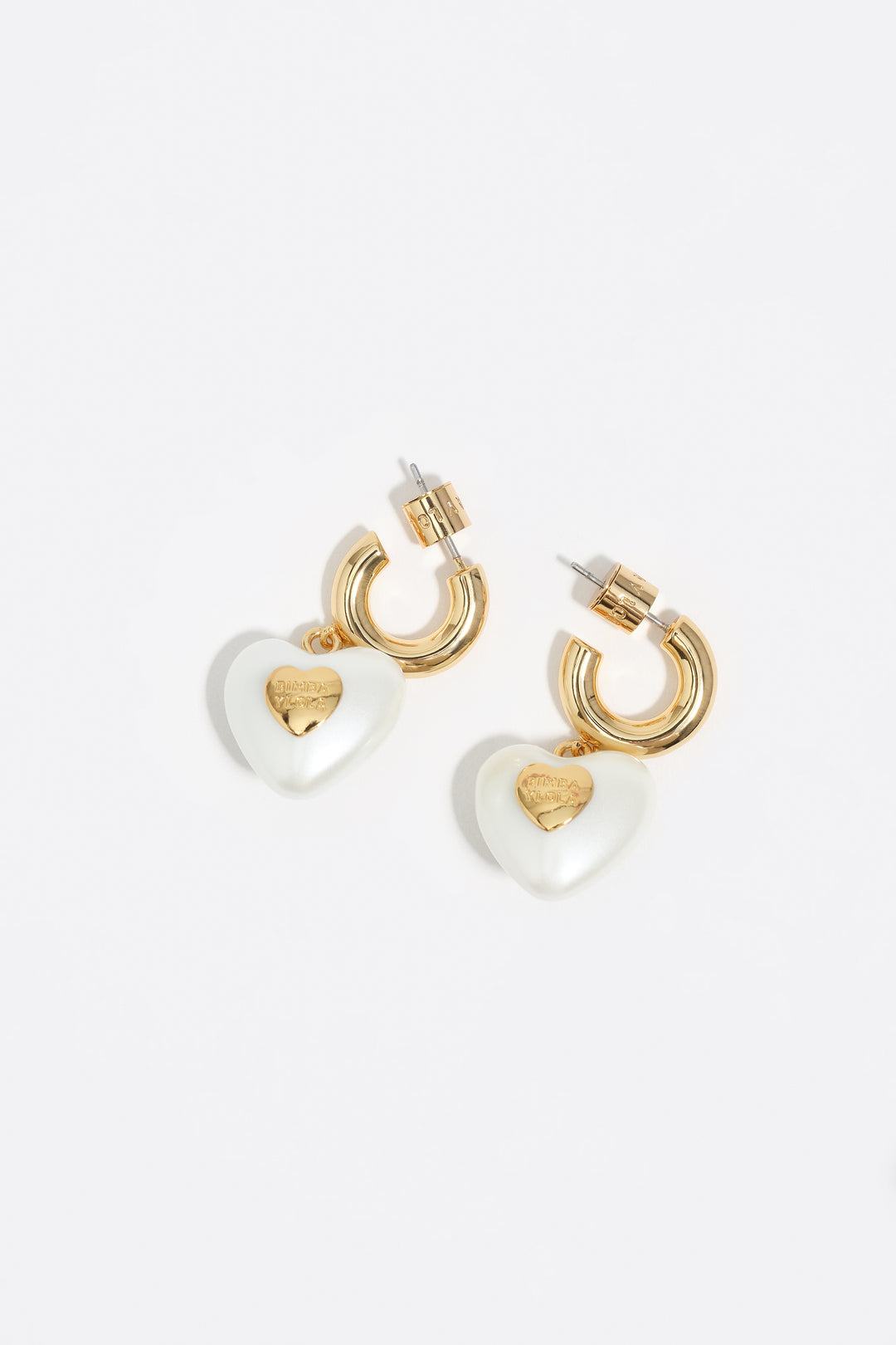Gold hoop earrings and pearl heart