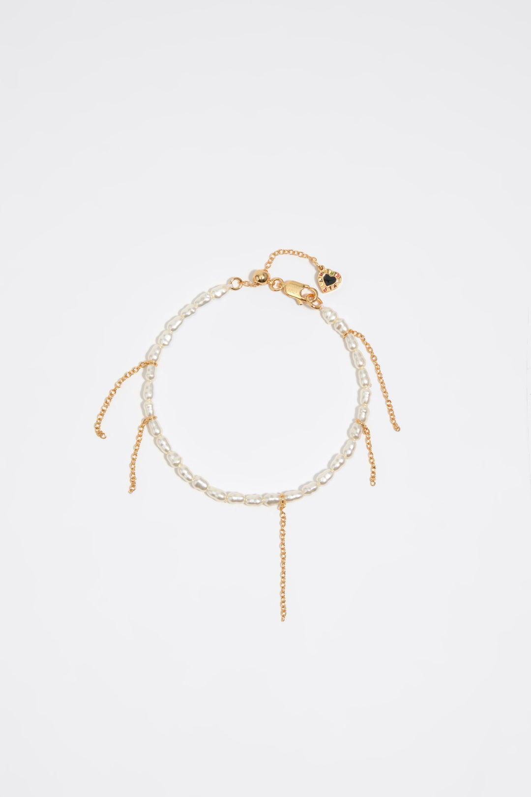 Golden chain and pearls bracelet