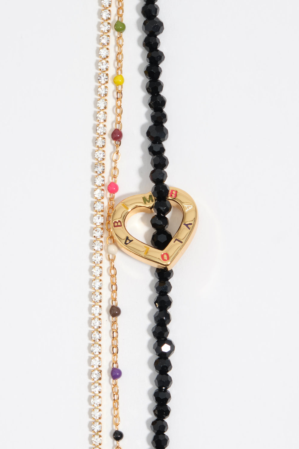 Triple crystal bracelet with gold heart logo