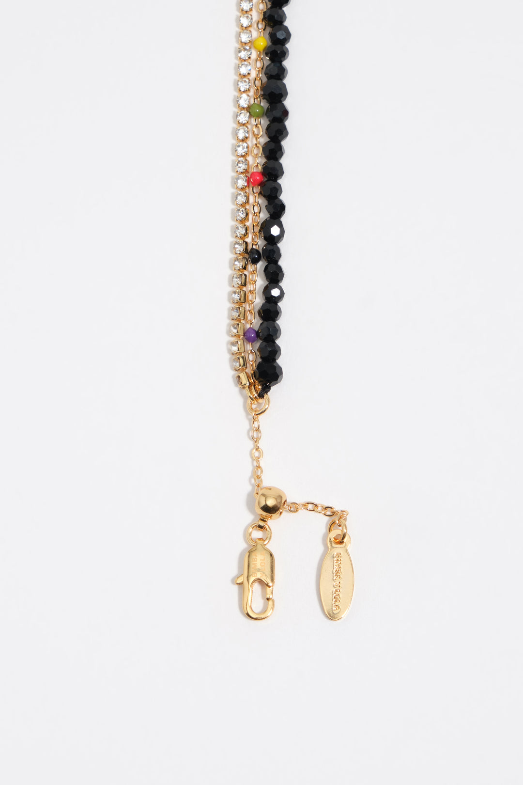 Triple crystal bracelet with gold heart logo