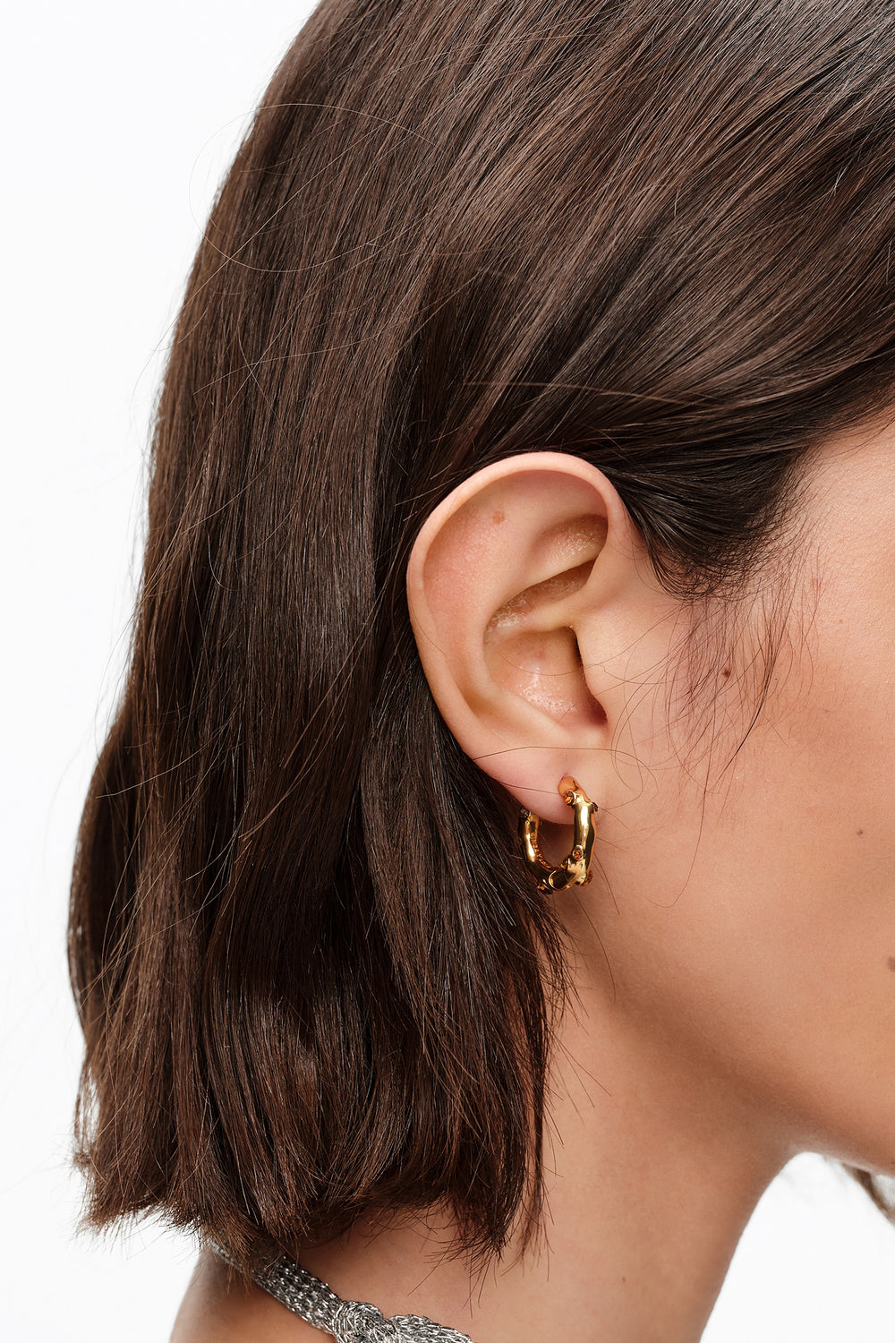 Gold crystal textured hoop earrings