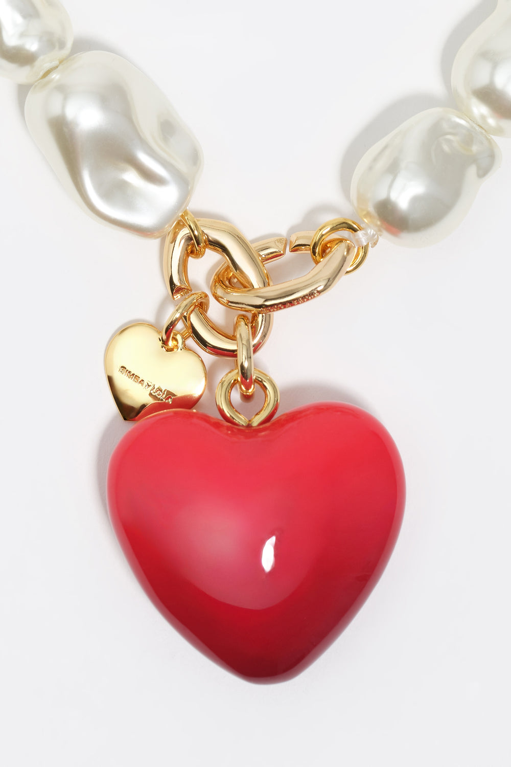 Pearls and red heart necklace