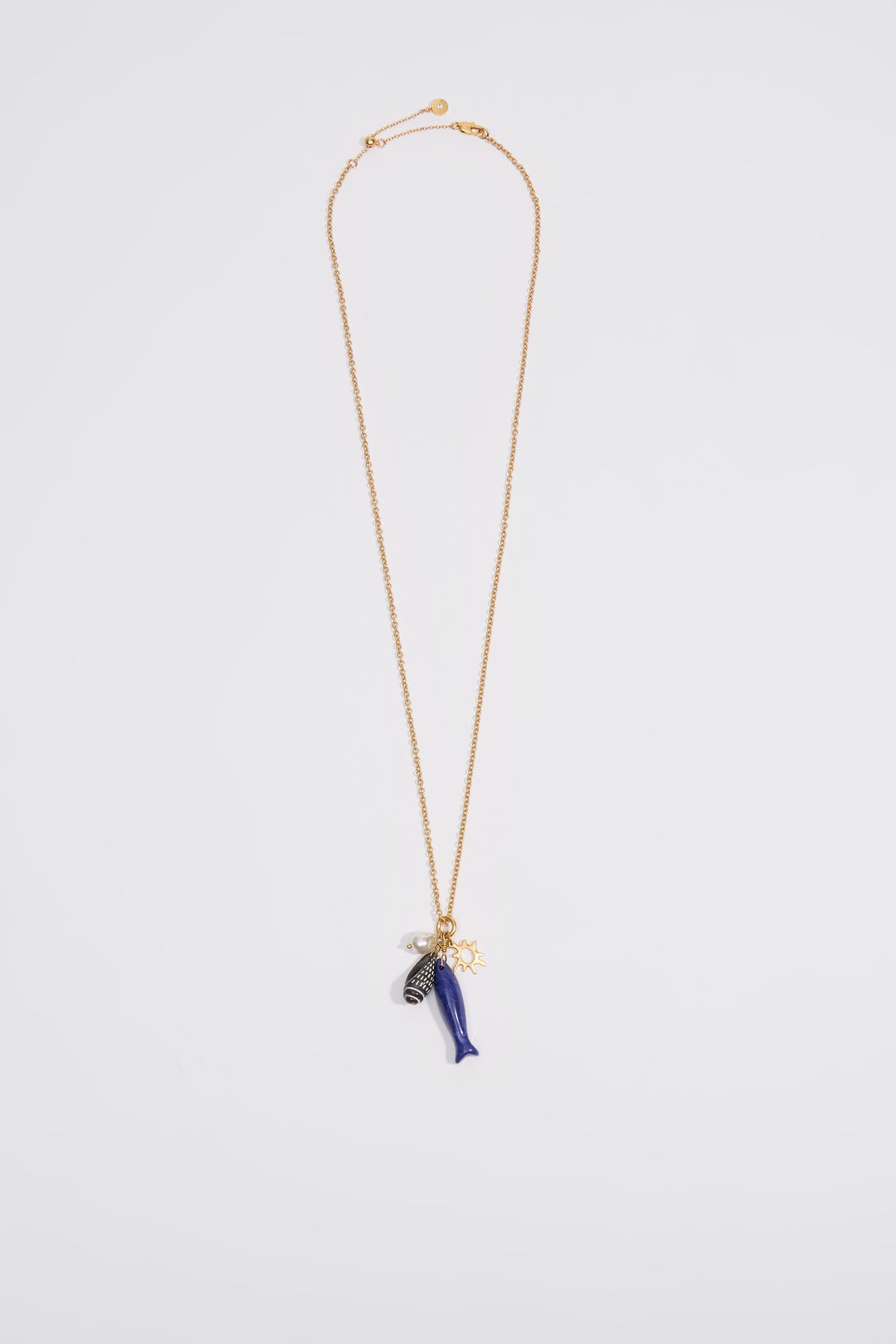 Aged gold necklace with fish and seashells