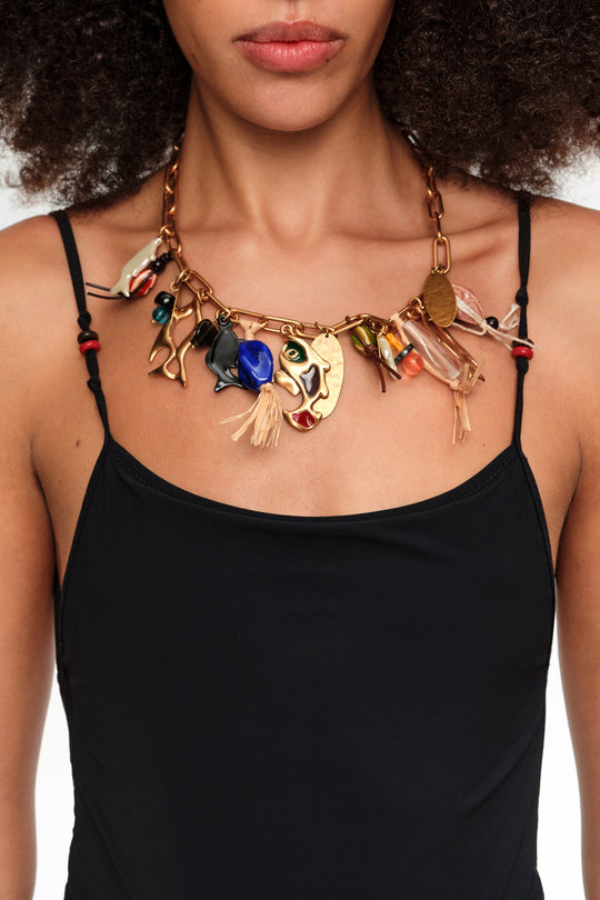 Necklace with aged gold fish and ceramics