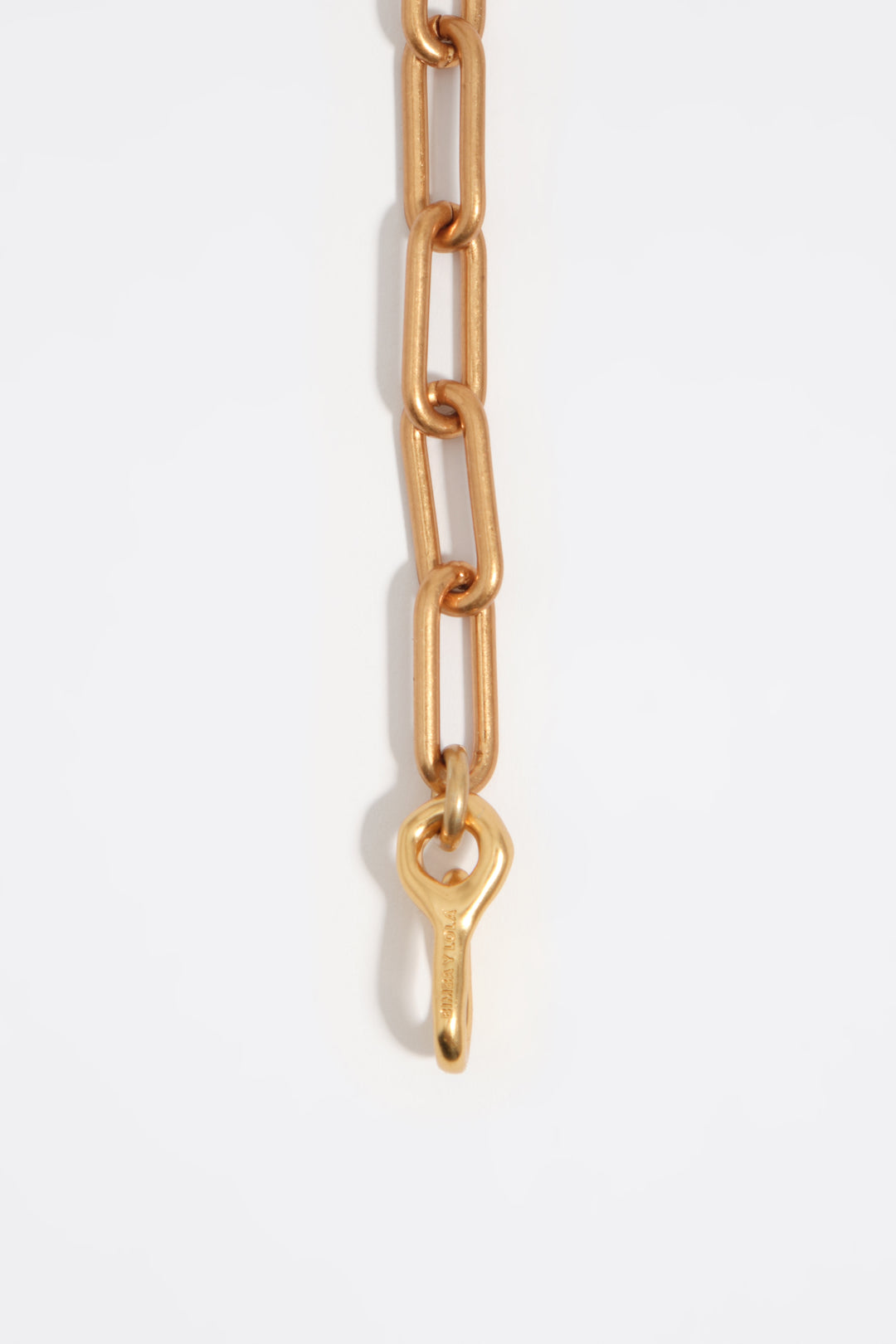 Necklace with aged gold fish and ceramics
