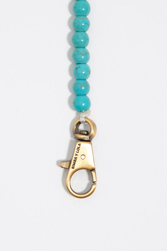 Necklace with natural seashell and turquoise stones