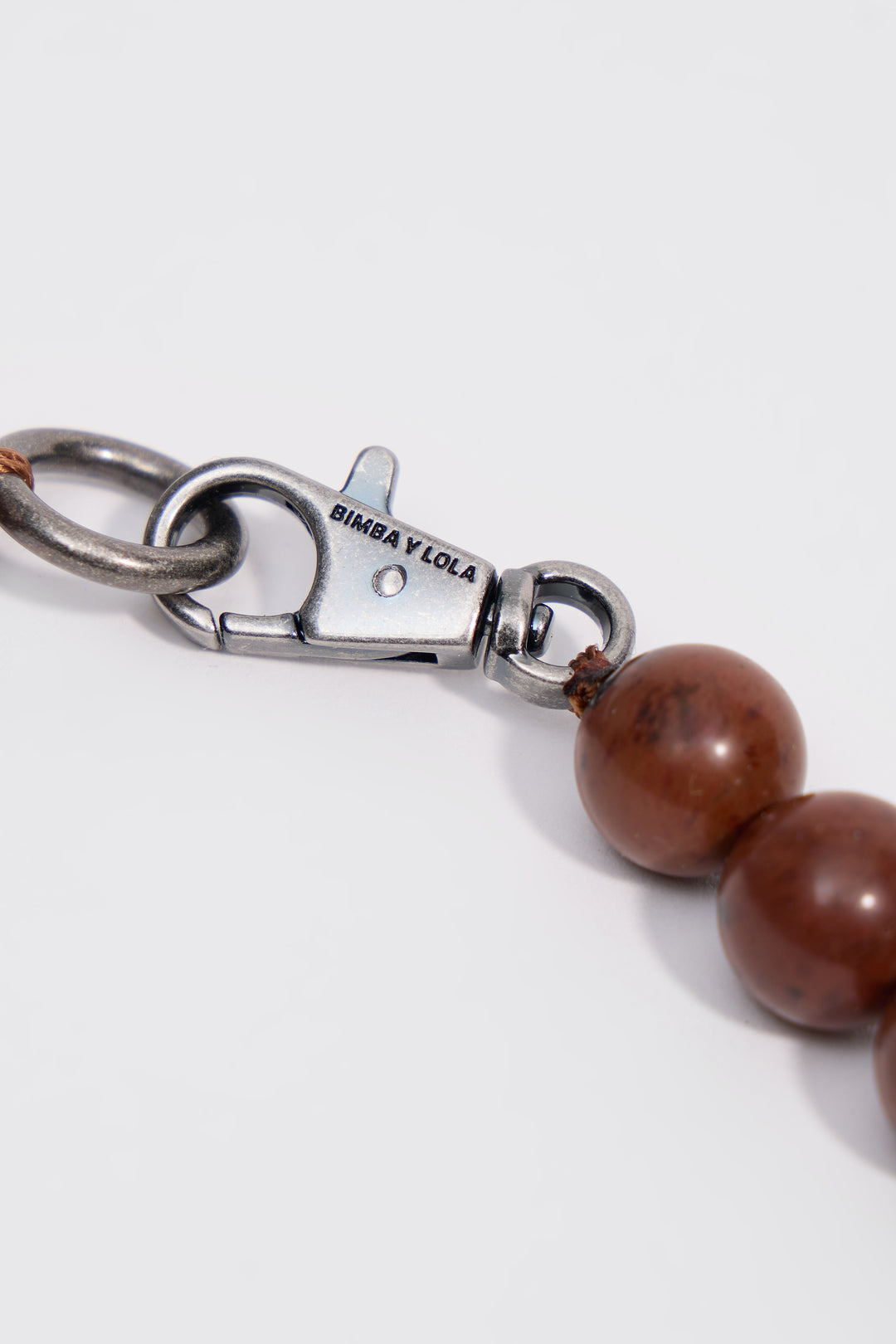 Aged silver necklace with stones and seashells