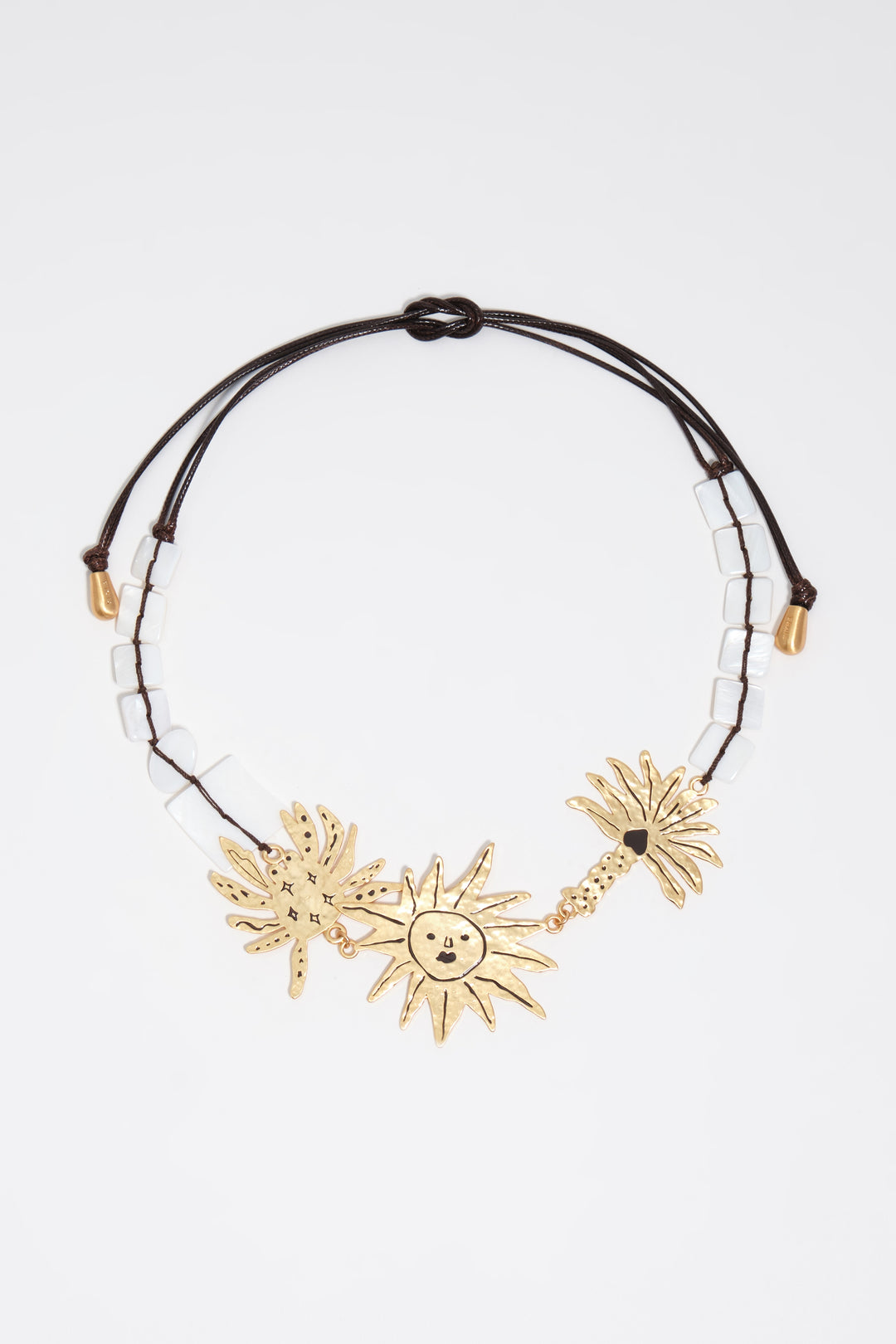Brushed gold sun and animal necklace
