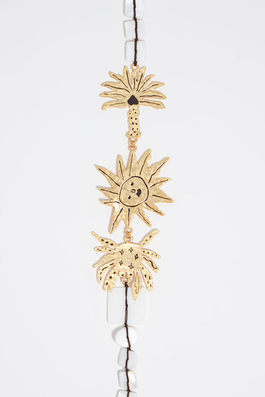 Brushed gold sun and animal necklace