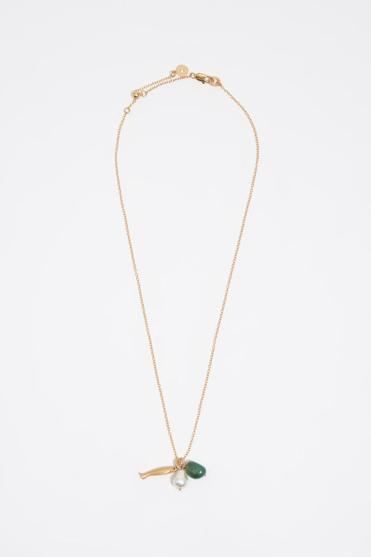 Aged gold necklace with fish and stone