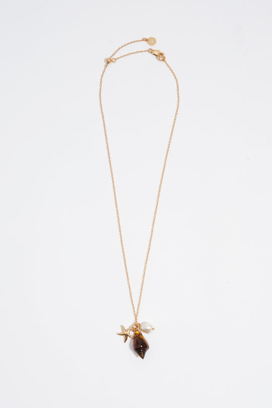 Aged gold star and shell necklace